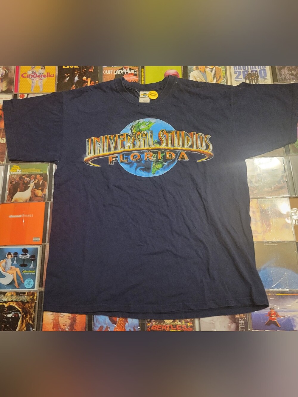 Universal Navy Graphic Tee with Multicolor Globe Logo